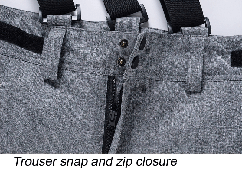 Close-up of ski suit trouser with snap and zip closure, featuring durable polyester fabric for windproof and waterproof protection.